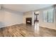 Spacious living room with elegant wood floors and a modern fireplace at 836 S Vance St # D, Lakewood, CO 80226