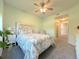 Bright bedroom with mint green walls, carpet, and a view to the hall at 4760 S Wadsworth Blvd # F105, Littleton, CO 80123