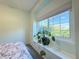 Bedroom with large window and window seat, great natural light and green view at 4760 S Wadsworth Blvd # F105, Littleton, CO 80123
