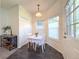 Cozy breakfast nook with tiled floors offers a bright and inviting dining space at 4760 S Wadsworth Blvd # F105, Littleton, CO 80123