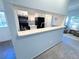 Modern kitchen features sleek countertops, stainless steel appliances, and stylish backsplash at 4760 S Wadsworth Blvd # F105, Littleton, CO 80123
