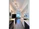 Sleek kitchen with white cabinets, modern appliances, and an open layout at 4760 S Wadsworth Blvd # F105, Littleton, CO 80123