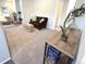Spacious living room features plush carpeting and comfortable seating for relaxation and entertainment at 4760 S Wadsworth Blvd # F105, Littleton, CO 80123