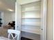 Well-organized pantry with shelving provides ample storage space for kitchen essentials at 4760 S Wadsworth Blvd # F105, Littleton, CO 80123