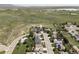 Aerial view of the home and neighborhood, showcasing the surrounding landscape and community at 6123 Dunraven Rd, Golden, CO 80403