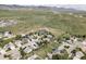 Scenic aerial view of the neighborhood with mountain views at 6123 Dunraven Rd, Golden, CO 80403
