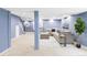 Spacious finished basement boasting modern lighting, plush seating, and an open floor plan at 6123 Dunraven Rd, Golden, CO 80403