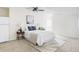 Cozy bedroom with a queen bed, wooden nightstands, and neutral carpet flooring at 6123 Dunraven Rd, Golden, CO 80403