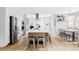 Bright and modern kitchen featuring stainless steel appliances and an island with seating at 6123 Dunraven Rd, Golden, CO 80403