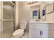 Clean bathroom features a walk-in shower, vanity, and modern fixtures at 18043 E Ohio Ave # 202, Aurora, CO 80017