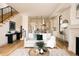 Bright, open-concept living space leading to a modern kitchen with stainless steel appliances at 2751 Curtis St, Denver, CO 80205
