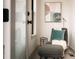 A calming reading nook features a comfortable chair and decor at 2751 Curtis St, Denver, CO 80205
