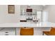 Modern kitchen with white countertops and stainless steel appliances at 2707 Decatur St, Denver, CO 80211