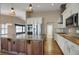 Well-equipped kitchen featuring stainless steel appliances and a large island at 8951 Greenwich St, Highlands Ranch, CO 80130