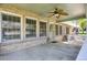 Covered patio with ample space and a ceiling fan, ideal for relaxation at 8951 Greenwich St, Highlands Ranch, CO 80130