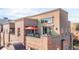 Relax on the private balcony, complete with an outdoor grill and comfortable seating area at 2397 E Iliff Ave, Denver, CO 80210