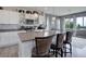 Kitchen with a large island and stainless steel appliances at 10906 Touchstone Loop, Parker, CO 80134