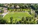 Aerial view of the community park with playground, soccer field, and picnic area at 9491 Southern Hills Cir, Lone Tree, CO 80124