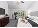 Cozy bedroom with plush carpeting, natural light, and stylish furnishings at 9491 Southern Hills Cir, Lone Tree, CO 80124
