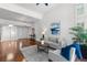 Inviting living room with hardwood floors, modern decor, and lots of space at 9491 Southern Hills Cir, Lone Tree, CO 80124