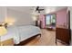 Comfortable bedroom with wood floors and views, providing a serene space at 6330 Old Orchard Ln, Sedalia, CO 80135