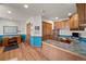 A bonus room has beautiful wainscotting, a desk, and ample cabinet storage at 6330 Old Orchard Ln, Sedalia, CO 80135