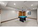 A game room features a pool table and recessed lighting at 6330 Old Orchard Ln, Sedalia, CO 80135