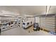 Spacious garage featuring ample workspace, storage, and vehicle parking, perfect for hobbies and projects at 6330 Old Orchard Ln, Sedalia, CO 80135