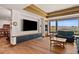 A spacious living room offers large windows and great natural light at 6330 Old Orchard Ln, Sedalia, CO 80135