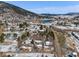 Scenic aerial view highlighting a peaceful community nestled near a lake and mountain range at 16 Prairie St, Palmer Lake, CO 80133