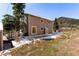 Spacious backyard featuring a patio with a mountain view at 16 Prairie St, Palmer Lake, CO 80133