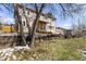 Charming two-story home with a welcoming front porch and well-maintained yard at 16 Prairie St, Palmer Lake, CO 80133