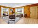 Bright living room showcases wood walls, modern furnishings, and natural light at 16 Prairie St, Palmer Lake, CO 80133