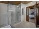 Bathroom boasts a glass-enclosed shower and stylish fixtures, blending functionality with modern design at 97 Soda Creek Rd, Evergreen, CO 80439