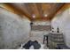 Unique wine cellar featuring a rustic barrel, stone floors, and custom storage for wine enthusiasts at 97 Soda Creek Rd, Evergreen, CO 80439