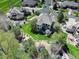 Aerial view of a house with well-maintained landscaping and backyard features at 12825 W 81St Ave, Arvada, CO 80005