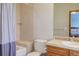 Well-appointed bathroom features a shower-tub combo and vanity with ample storage at 12825 W 81St Ave, Arvada, CO 80005