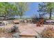 Backyard fire pit area with stone pavers and seating, perfect for relaxation at 12825 W 81St Ave, Arvada, CO 80005