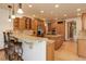 Bright kitchen with granite countertops, a large island, and stainless steel appliances create an inviting atmosphere at 12825 W 81St Ave, Arvada, CO 80005