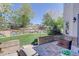Inviting patio with stone pavers and seating, perfect for outdoor relaxation at 12825 W 81St Ave, Arvada, CO 80005