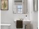 Modern bathroom with white vanity and chrome fixtures at 1313 N Williams St # 703, Denver, CO 80218
