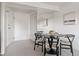 Small dining area with round table and four chairs at 1313 N Williams St # 703, Denver, CO 80218