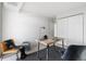 Modern home office with wood desk and plenty of natural light at 1313 N Williams St # 703, Denver, CO 80218