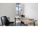 Home office with a large window offering city views at 1313 N Williams St # 703, Denver, CO 80218