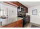Updated kitchen with granite countertops and stainless steel appliances at 1313 N Williams St # 703, Denver, CO 80218