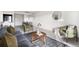 Living area features a stylish coffee table and comfortable seating at 1313 N Williams St # 703, Denver, CO 80218