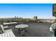 Rooftop deck features urban views, seating, and grill at 1313 N Williams St # 703, Denver, CO 80218