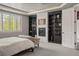 Spacious bedroom with fireplace, built-in shelves, and large windows for natural light at 14841 W Warren Ave, Lakewood, CO 80228