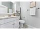 Clean bathroom with white vanity and updated fixtures at 4626 S Dillon Ct # B, Aurora, CO 80015