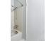 Bathroom with a shower/tub combination and tile surround at 4626 S Dillon Ct # B, Aurora, CO 80015